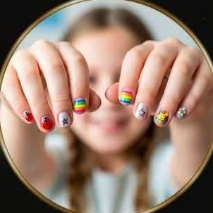 Child showing colorful painted nails