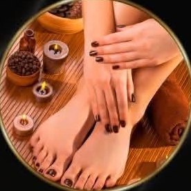 Feet in a wooden spa bowl